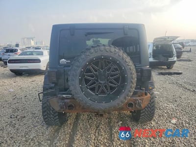 Zdjęcie 6 z 13 samochodu: 2013 JEEP WRANGLER UNLIMITED SPORT VIN:1C4BJWDGXDL588042 - miniatura