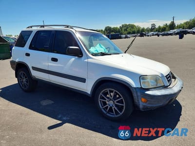 Czwarte zdjęcie samochodu z boku: 2001 HONDA CR-V LX VIN:JHLRD18491C042565 - miniatura