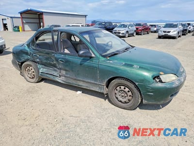 Czwarte zdjęcie samochodu z boku: 1997 HYUNDAI ELANTRA BASE VIN:KMHJF24M0VU594077 - miniatura