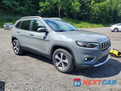 Czwarte zdjęcie samochodu z boku: 2020 JEEP CHEROKEE LIMITED VIN:1C4PJMDX1LD575232 - miniatura