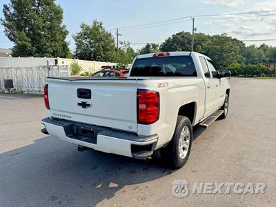 Trzecie zdjęcie samochodu z tyłu: 2017 CHEVROLET SILVERADO K1500 LT VIN:1GCVKREC1HZ142730 - miniatura