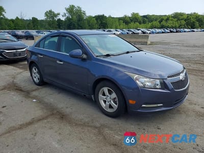 Czwarte zdjęcie samochodu z boku: 2014 CHEVROLET CRUZE LT VIN:1G1PC5SBXE7400253 - miniatura