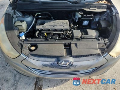 Zdjęcie 12 z 13 samochodu: 2012 HYUNDAI TUCSON GLS VIN:KM8JU3AC2CU485494 - miniatura