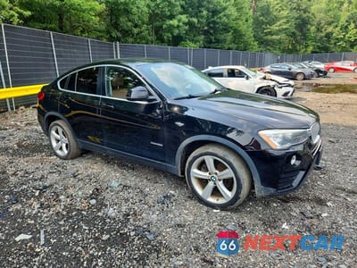 Czwarte zdjęcie samochodu z boku: 2016 BMW X4 XDRIVE28I VIN:5UXXW3C50G0R19947 - miniatura