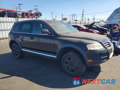 Czwarte zdjęcie samochodu z boku: 2004 VOLKSWAGEN TOUAREG TDI 5.0 VIN:WVGPZ77L04D086515 - miniatura