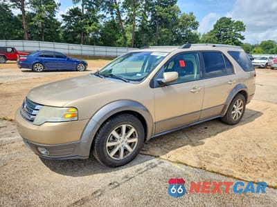 2008 FORD TAURUS X SEL 1FMDK05W28GA00735 - główne zdjęcie licytacji z USA - miniatura