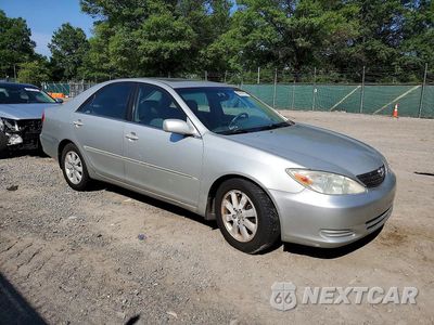 Czwarte zdjęcie samochodu z boku: 2002 TOYOTA CAMRY XLE V6 VIN:4T1BF30K42U010578 - miniatura