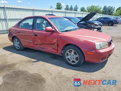 Czwarte zdjęcie samochodu z boku: 2002 HYUNDAI ELANTRA GLS VIN:KMHDN45D92U399911 - miniatura