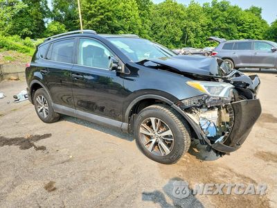 Czwarte zdjęcie samochodu z boku: 2017 TOYOTA RAV4 XLE VIN:2T3RFREV7HW654323 - miniatura