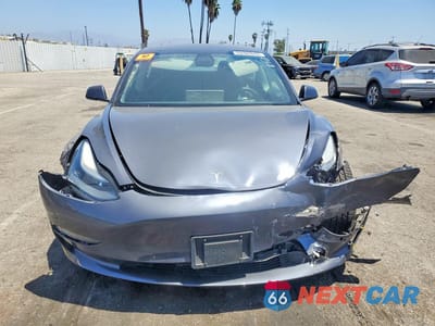 Piąte zdjęcie samochodu w środku: 2021 TESLA MODEL 3 VIN:5YJ3E1EB2MF025259 - miniatura