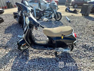 Trzecie zdjęcie samochodu z tyłu: 2013 VESPA LX 150IE VIN:ZAPM688F5D5004205 - miniatura