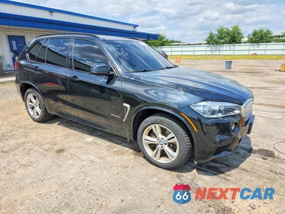 Czwarte zdjęcie samochodu z boku: 2014 BMW X5 XDRIVE50I VIN:5UXKR6C57E0J73531 - miniatura