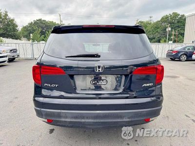Piąte zdjęcie samochodu w środku: 2016 HONDA PILOT EXL VIN:5FNYF6H50GB053393 - miniatura