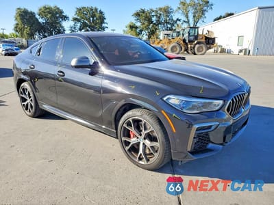 Czwarte zdjęcie samochodu z boku: 2022 BMW X6 M50I VIN:5UXCY8C07N9N02909 - miniatura