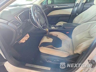 Zdjęcie 7 z 12 samochodu: 2017 FORD FUSION TITANIUM PHEV VIN:3FA6P0SU6HR354192 - miniatura