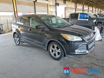 Czwarte zdjęcie samochodu z boku: 2015 FORD ESCAPE SE VIN:1FMCU0G76FUA25731 - miniatura