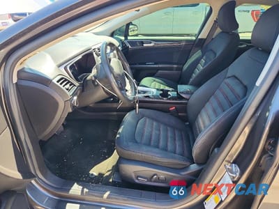 Zdjęcie 7 z 12 samochodu: 2016 FORD FUSION SE VIN:3FA6P0H72GR114654 - miniatura