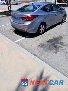 Czwarte zdjęcie samochodu z boku: 2015 HYUNDAI ELANTRA SE VIN:KMHDH4AE9FU450027 - miniatura