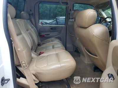 Zdjęcie 10 z 12 samochodu: 2001 FORD F150 SUPERCREW VIN:1FTRW08L41KC47158 - miniatura
