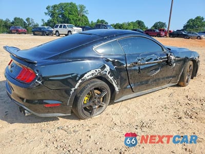 Trzecie zdjęcie samochodu z tyłu: 2018 FORD MUSTANG GT VIN:1FA6P8CF0J5106530 - miniatura