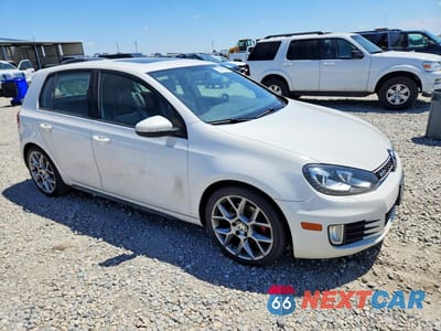 Czwarte zdjęcie samochodu z boku: 2013 VOLKSWAGEN GTI VIN:WVWHV7AJ1DW140307 - miniatura