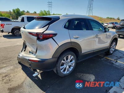 Trzecie zdjęcie samochodu z tyłu: 2022 MAZDA CX-30 PREFERRED VIN:3MVDMBCL2NM405691 - miniatura