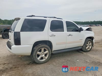 Trzecie zdjęcie samochodu z tyłu: 2011 CHEVROLET TAHOE C1500 LT VIN:1GNSCBE05BR336415 - miniatura