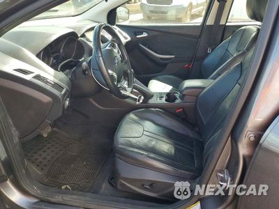 Zdjęcie 7 z 12 samochodu: 2014 FORD FOCUS TITANIUM VIN:1FADP3J22EL427254 - miniatura