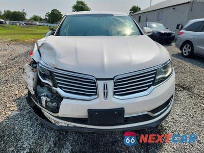 Piąte zdjęcie samochodu w środku: 2017 LINCOLN MKX PREMIERE VIN:2LMPJ8JR8HBL37033 - miniatura