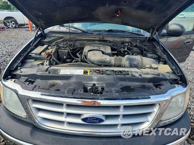 Zdjęcie 11 z 12 samochodu: 2003 FORD F150 SUPERCREW VIN:1FTRW07L43KD15866 - miniatura
