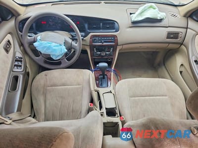 Zdjęcie 8 z 13 samochodu: 1999 NISSAN ALTIMA XE VIN:1N4DL01D5XC124340 - miniatura