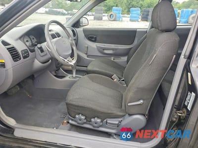 Zdjęcie 7 z 12 samochodu: 2004 HYUNDAI ACCENT GL VIN:KMHCG35C04U303951 - miniatura