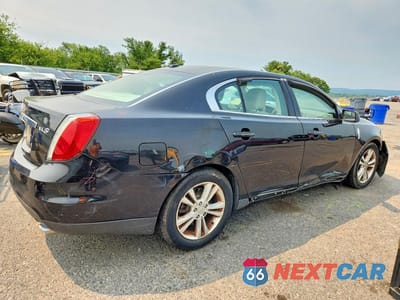 Trzecie zdjęcie samochodu z tyłu: 2011 LINCOLN MKS VIN:1LNHL9DRXBG605737 - miniatura