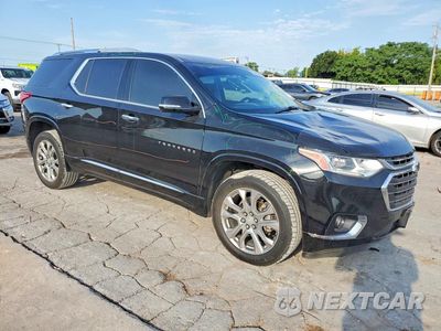 Czwarte zdjęcie samochodu z boku: 2018 CHEVROLET TRAVERSE PREMIER VIN:1GNERKKW5JJ272006 - miniatura