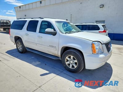 Czwarte zdjęcie samochodu z boku: 2012 GMC YUKON XL K1500 SLT VIN:1GKS2KE72CR121654 - miniatura