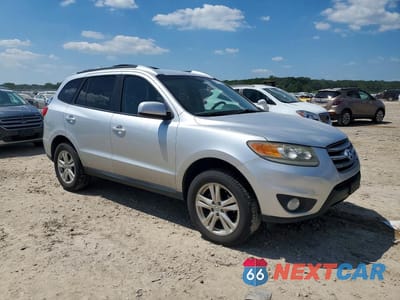 Czwarte zdjęcie samochodu z boku: 2012 HYUNDAI SANTA FE SE VIN:5XYZHDAG0CG104053 - miniatura