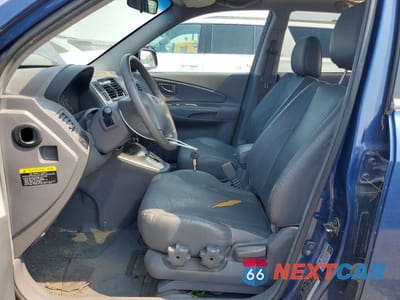 Zdjęcie 7 z 12 samochodu: 2005 HYUNDAI TUCSON GLS VIN:KM8JN72D15U131822 - miniatura