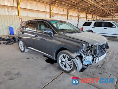 Czwarte zdjęcie samochodu z boku: 2010 LEXUS RX 450H VIN:JTJZB1BA5A2004335 - miniatura