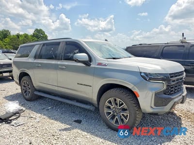 Czwarte zdjęcie samochodu z boku: 2024 CHEVROLET SUBURBAN K1500 Z71 VIN:1GNSKDKD0RR121458 - miniatura