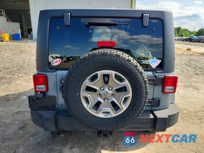 Zdjęcie 6 z 12 samochodu: 2014 JEEP WRANGLER UNLIMITED RUBICON VIN:1C4BJWFG0EL297144 - miniatura