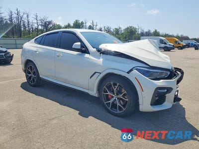 Czwarte zdjęcie samochodu z boku: 2021 BMW X6 XDRIVE40I VIN:5UXCY6C02M9G33929 - miniatura