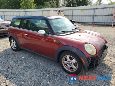 Czwarte zdjęcie samochodu z boku: 2009 MINI COOPER CLUBMAN VIN:WMWML33509TN68677 - miniatura