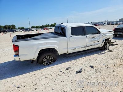 Trzecie zdjęcie samochodu z tyłu: 2021 TOYOTA TACOMA SR5 V6 VIN:3TMBZ5DN9MM031090 - miniatura