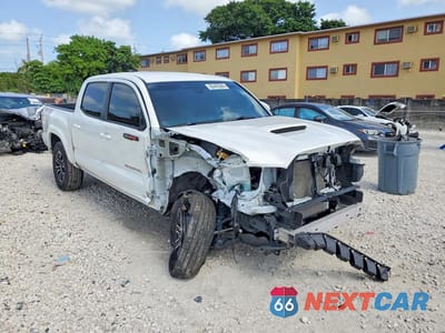 Czwarte zdjęcie samochodu z boku: 2023 TOYOTA TACOMA TRD SPORT VIN:3TMCZ5AN1PM621748 - miniatura