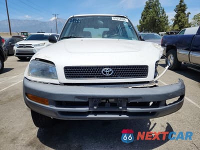 Piąte zdjęcie samochodu w środku: 1997 TOYOTA RAV4 BASE VIN:JT3GP10V3V0018659 - miniatura