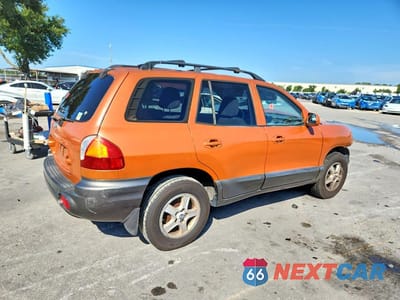 Trzecie zdjęcie samochodu z tyłu: 2002 HYUNDAI SANTA FE GLS VIN:KM8SC13D72U204399 - miniatura