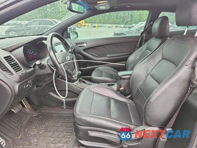 Zdjęcie 7 z 12 samochodu: 2016 KIA FORTE KOUP SX VIN:KNAFZ6A31G5601360 - miniatura