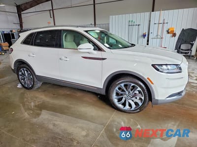 Czwarte zdjęcie samochodu z boku: 2023 LINCOLN NAUTILUS RESERVE VIN:2LMPJ8K91PBL02170 - miniatura