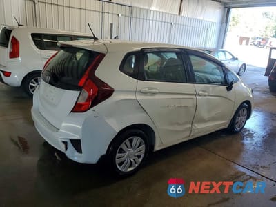 Trzecie zdjęcie samochodu z tyłu: 2016 HONDA FIT LX VIN:JHMGK5H59GS013834 - miniatura
