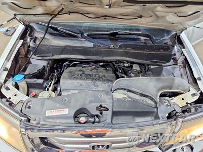 Zdjęcie 12 z 13 samochodu: 2011 HONDA PILOT EXL VIN:5FNYF4H67BB032613 - miniatura